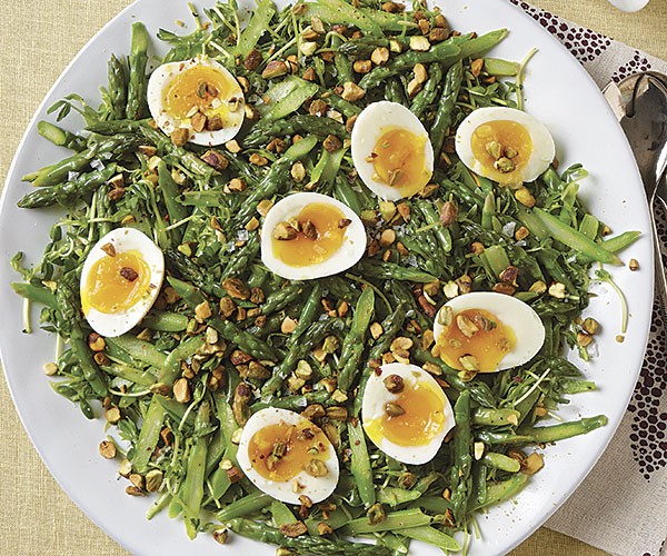Asparagus and pea shoot salad with pistachios and soft-cooked eggs