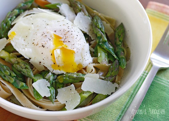 Asparagus and poached eggs over pasta
