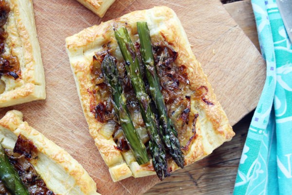 Asparagus, caramelised onion and cheddar tarts