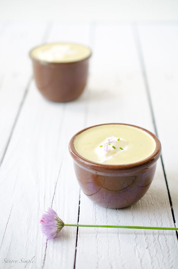 Asparagus soup with crème fraîche and chive blossoms
