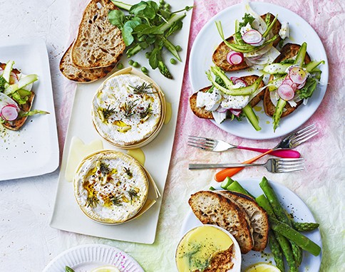 Asparagus toasts 3 ways by Ginny Rolfe: baked oozy Tunworth cheese with pea & watercress salad