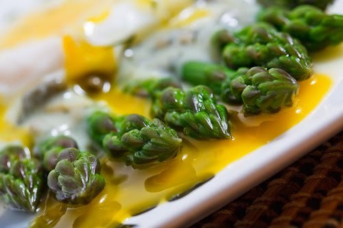 Asparagus with a poached egg in a dill and caper avgolemono sauce