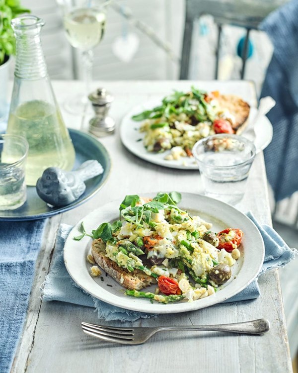 Asparagus with eggs, sun-blush tomatoes, black olives & baked ricotta