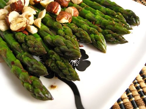 Asparagus with garam masala, butter and toasted hazelnuts