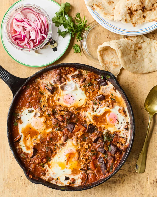 Aubergine and fava beans with eggs