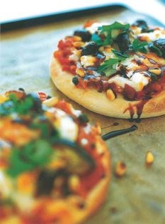 Aubergine, chocolate and goats’ cheese pizzette