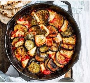 Aubergine, halloumi & harissa skillet bake