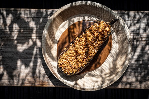Aubergine ‘steak’ with sourdough molé and hazelnuts
