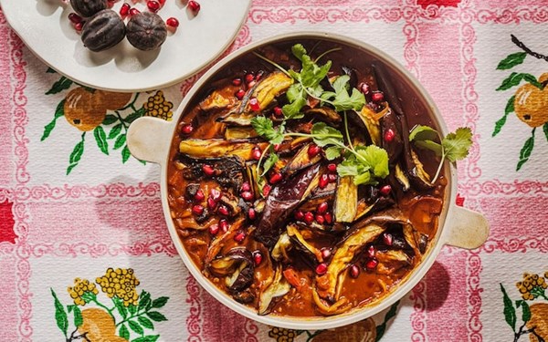 Aubergines and tomatoes with black lime and honey