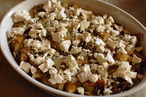 Aubergines with fried onions and chopped lemon