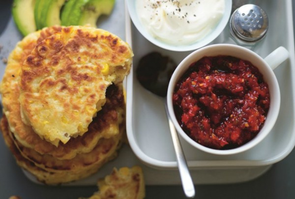 Aussie sweet corn breakfast fritters with avocado & arugula salad & sweet chili jam