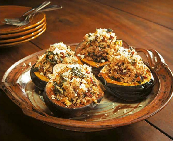 Autumn acorn squash stuffed with kale, cranberries, and walnuts