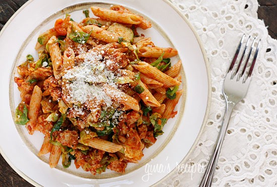 Autumn penne pasta with sauteed Brussels sprouts in a light ragu