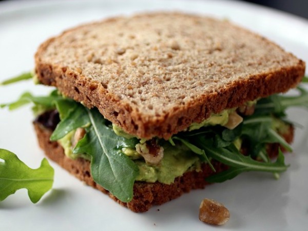 Avocado, arugula, and walnut sandwiches