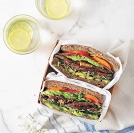 Avocado club sandwich with marinated portobello mushrooms