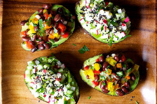 Avocado cup salads with cucumbers, radishes and ginger-miso dressing 
