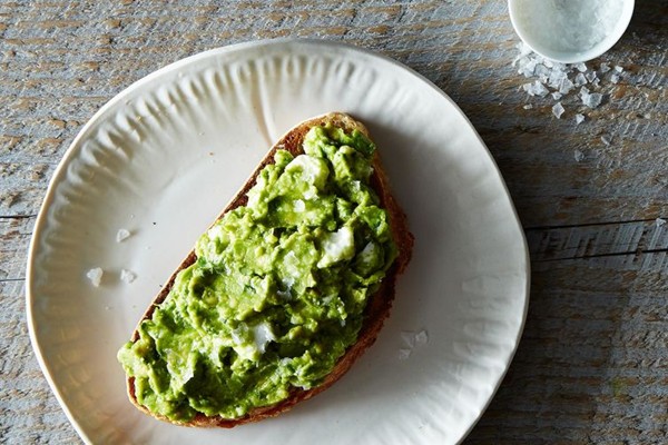 Avocado, feta, and mint on sourdough toast