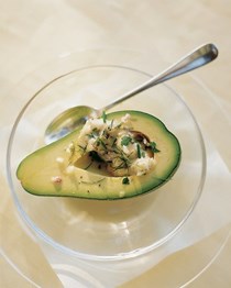 Avocado filled with mixed herb and shallot vinaigrette