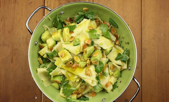 Avocado, ginger and roasted almonds with pasta and fresh coriander