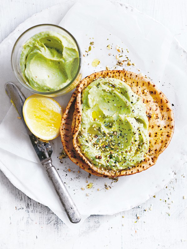 Avocado hummus with dukkah on toasted flatbreads