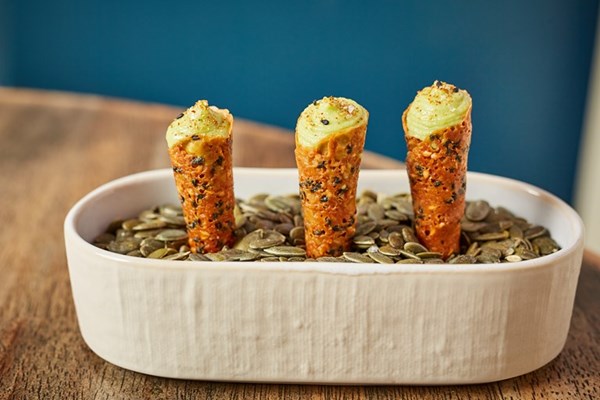 Avocado ice cream with sesame cones