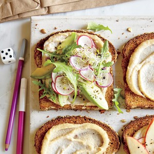 Avocado, sprout, and cashew spread sandwich