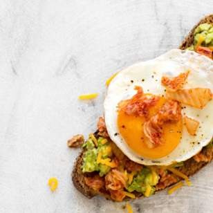 Avocado toast with egg, cheddar & kimchi