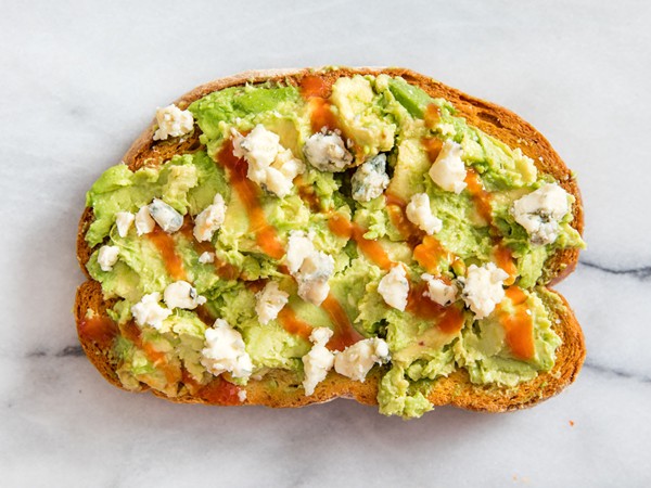 Avocado toast with Frank's RedHot and blue cheese