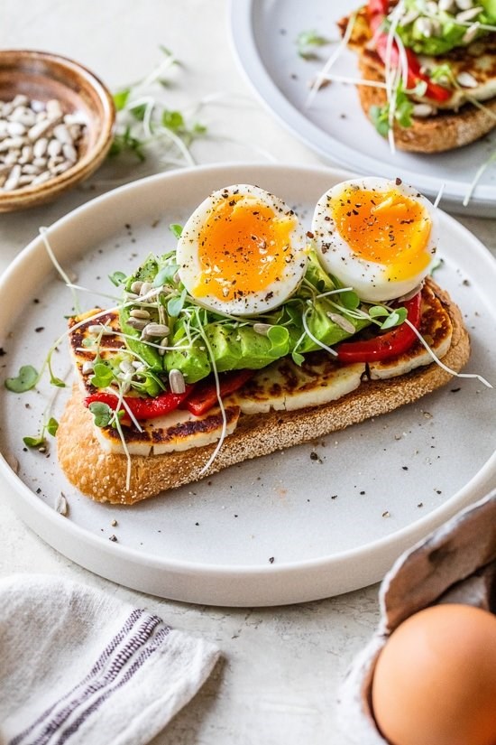 Avocado toast with halloumi and egg