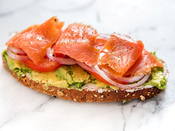 Avocado toast with smoked salmon, goat cheese, and capers