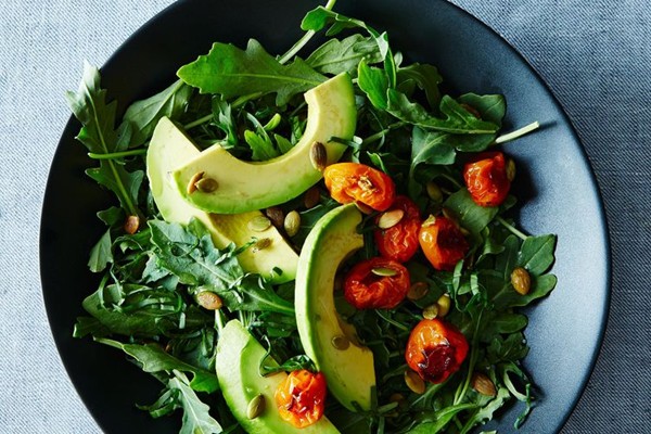 Avocado with pomegranate molasses, tomatoes, citrus, and basil