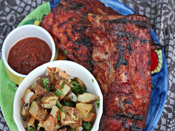 Baby back ribs with mojo barbecue sauce