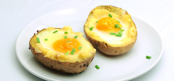 Baby baked eggs in potatoes