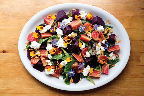 Baby beets and beet greens with fried garlic and chèvre