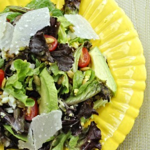 Baby greens with eggs, avocado, and shaved Parmesan