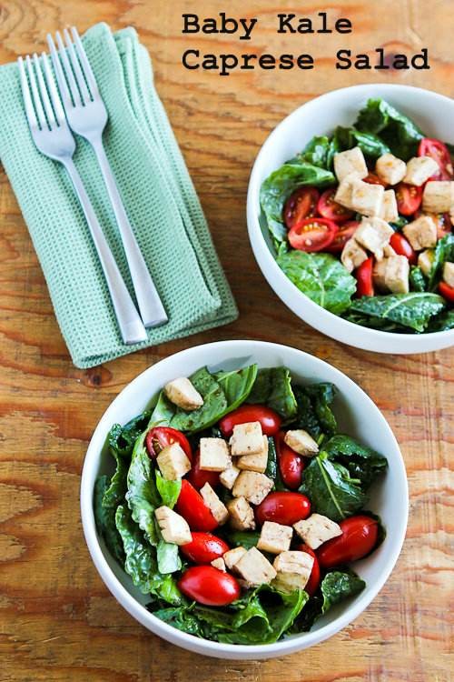 Baby kale Caprese-style salad with fresh mozzarella, tomatoes, and basil