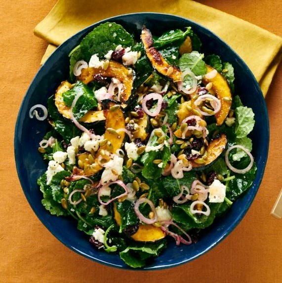 Baby kale salad with acorn squash and goat cheese
