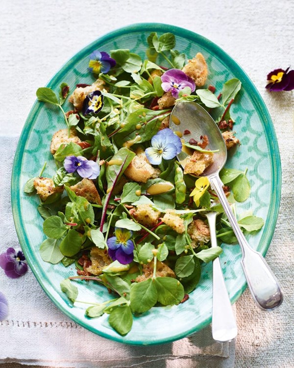 Baby leaf salad with bacon and tarragon croutons and edible flowers 