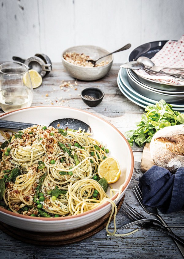 Baby pea, asparagus, prosciutto & kale spaghetti with lemon & macadamia pangrattato