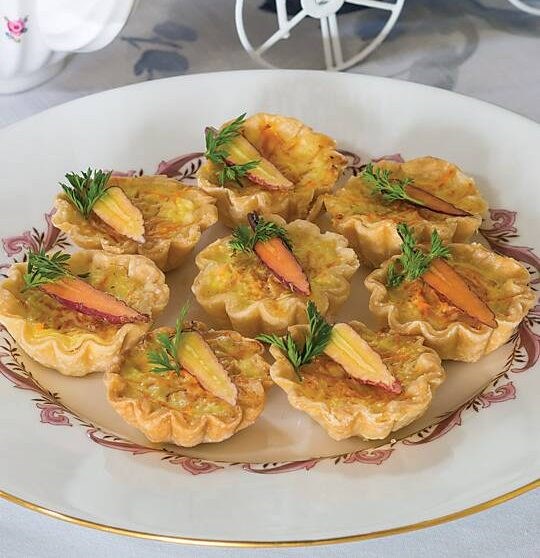 Baby quiches with tiny carrots
