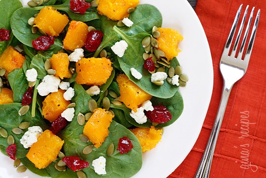 Baby spinach salad with honey roasted butternut squash, pumpkin seeds, Gorgonzola and dried cherries