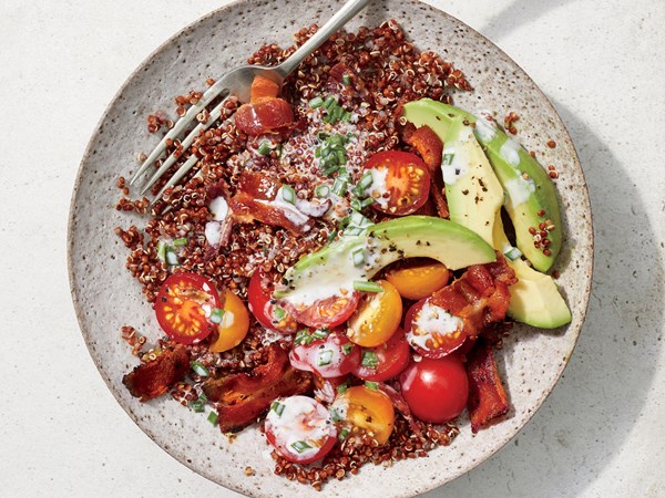 Bacon and avocado quinoa bowl with buttermilk-chive drizzle