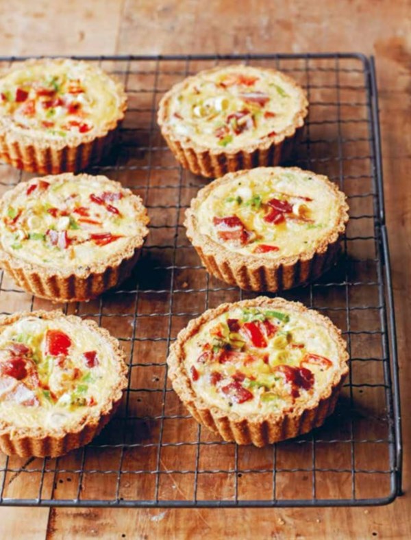 Bacon-and-egg pies with spring onions (scallions) and tomato