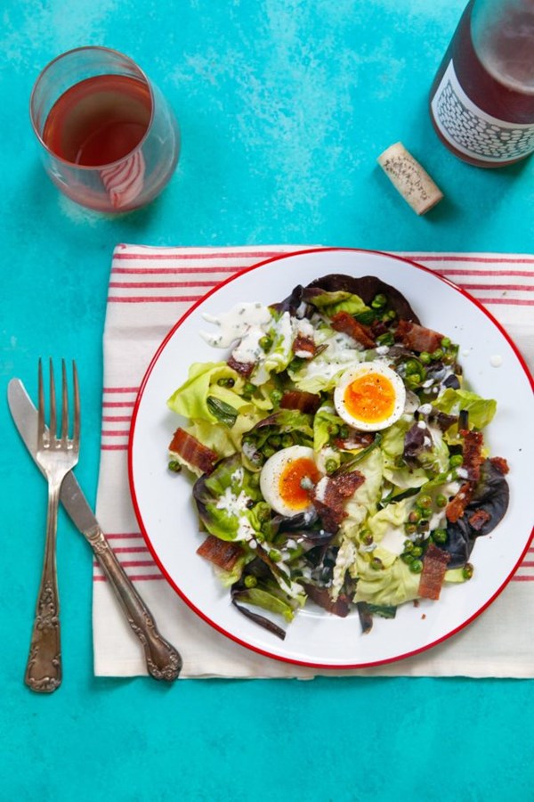 Bacon and egg salad with crispy peas and scallions