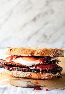 Bacon and egg sandwich with kasundi jam