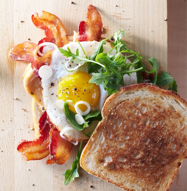 Bacon and egg sandwiches with pickled spring onions