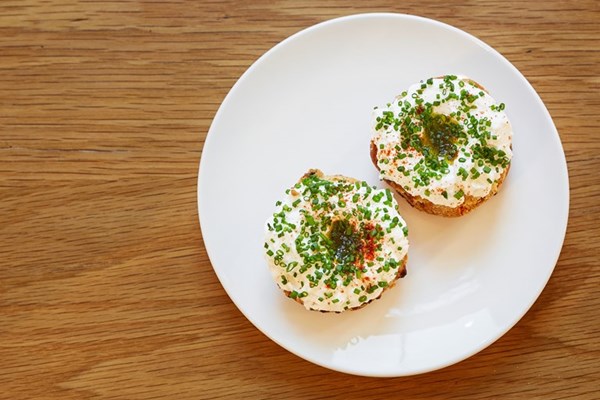 Bacon scones with goat's curd and chives [chive oil]