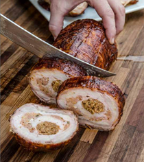 Bacon-wrapped and boudin-stuffed pork tenderloin