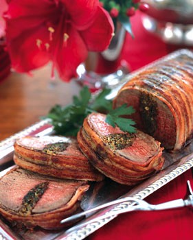 Bacon-wrapped beef tenderloin with herb stuffing