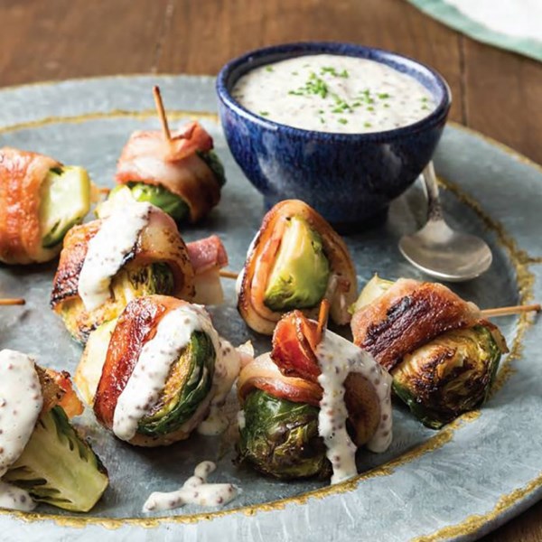 Bacon-wrapped Brussels sprouts with mustard sauce